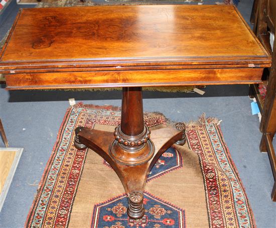 Thomas and George Seddon. An early Victorian rosewood card table, with folding rectangular top, beaded turned stem, triangular platform